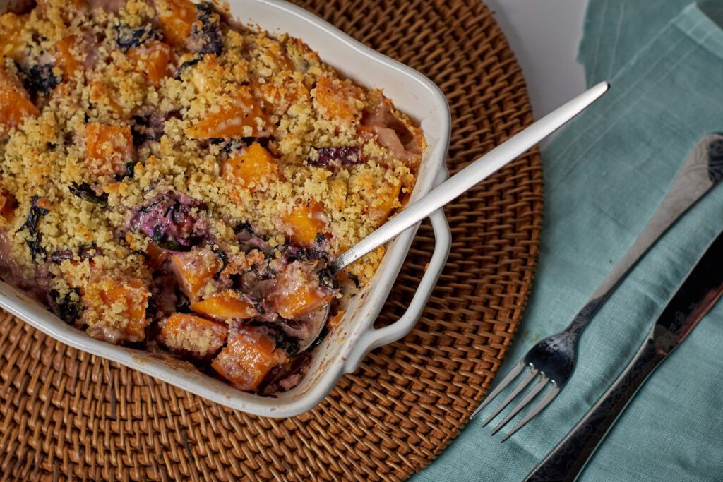Butternut Squash Gratin with Napa Cabbage and Beet Greens