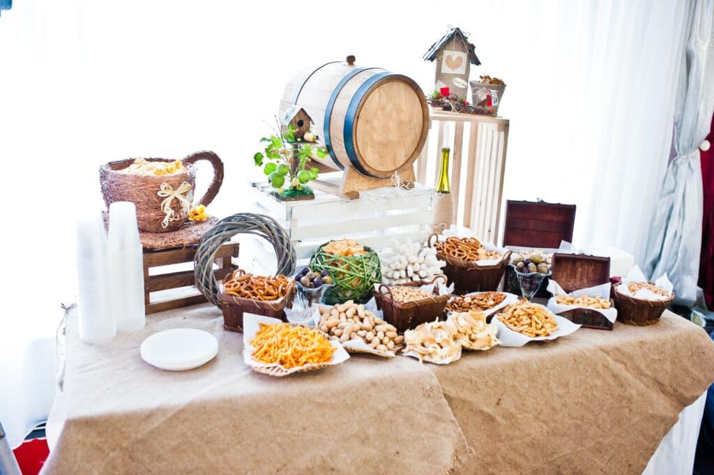 Wedding reception catering table with different snacks.