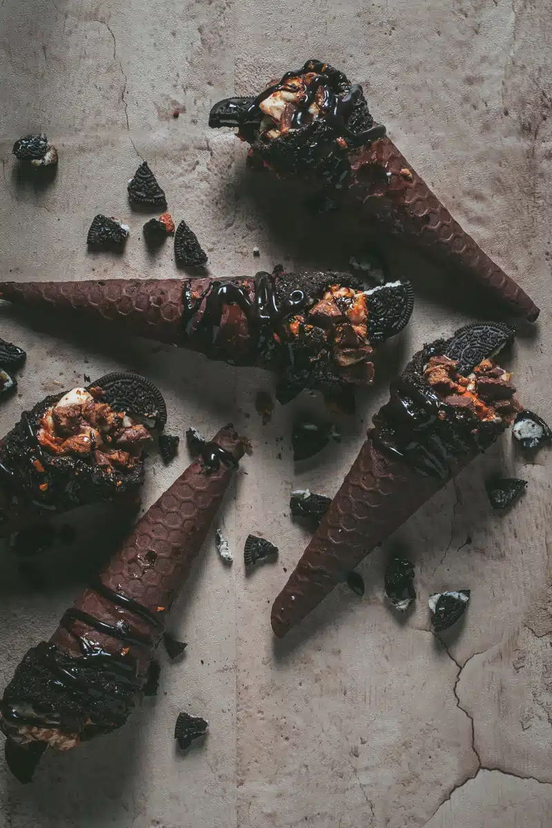 stuffed cheesecake waffle cones with Oreos Reese's butterfingers creamy crunchy fall Halloween dessert
