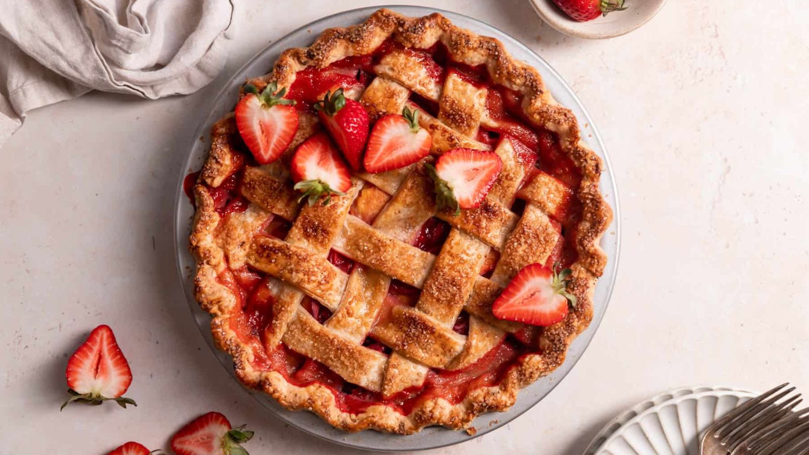 22 Summer Recipes That Are Breaking the Internet Brown Butter Strawberry Peach Pie by Cambrea Bakes