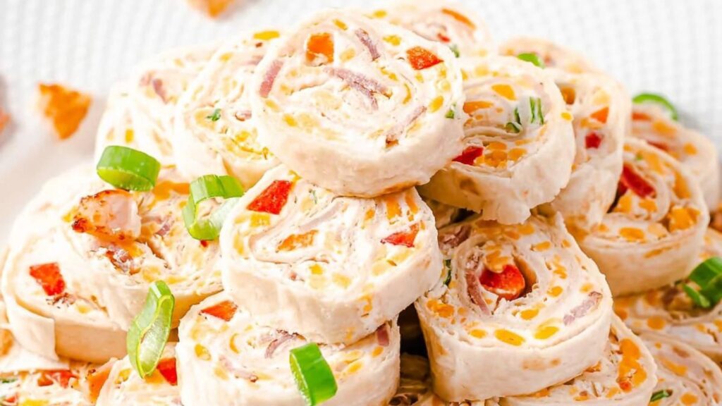 The Ultimate Finger Food: 21 Pinwheel Recipes Cheddar Bacon Ranch Cream Cheese Pinwheels by This Silly Girl's Kitchen
