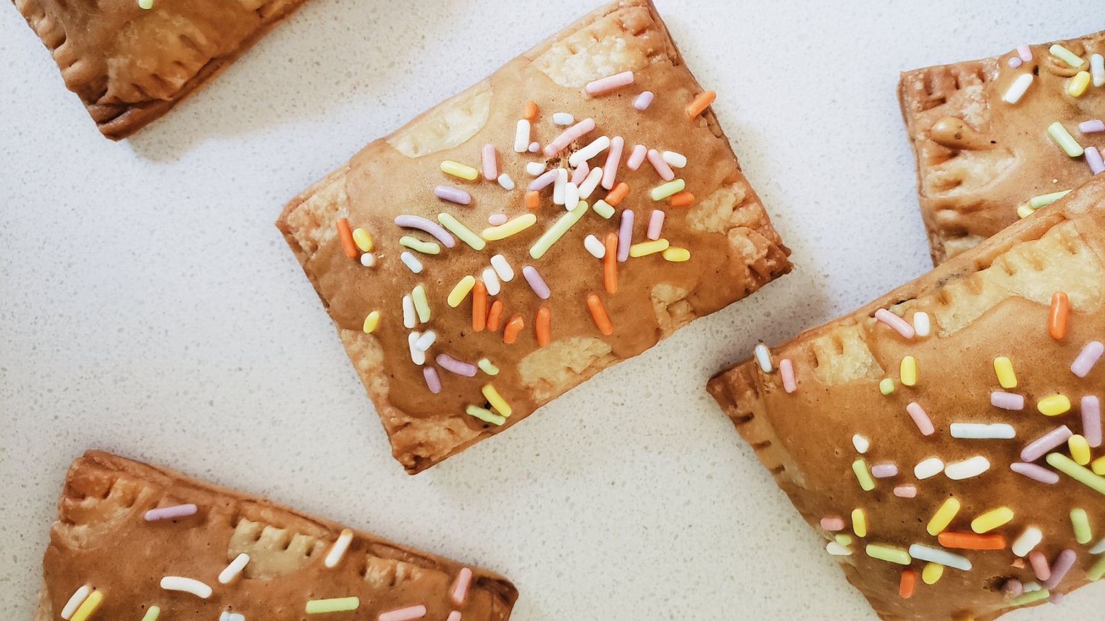 From Small Screen to Big Flavors: 14 TV Recipes Worth Breaking the Fourth Wall Gilmore Girls Chocolate Filled Pop Tarts with Coffee Glaze by A Dash of Cinema