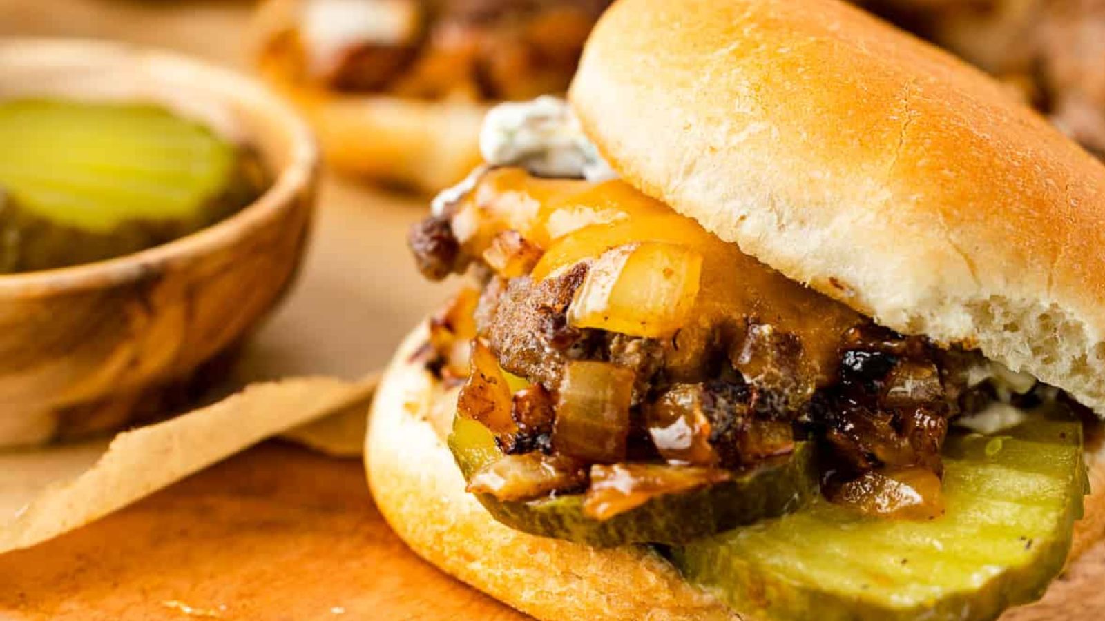 Small But Mighty: 21 Slider Recipes That Pack a Punch Grilled Onion Cheddar Sliders by The Sassy Foodie