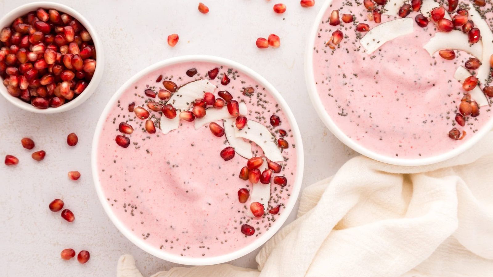 Too Pretty to Eat? 15 Vibrant Smoothie Bowls Pomegranate Smoothie Bowl by Living Chirpy