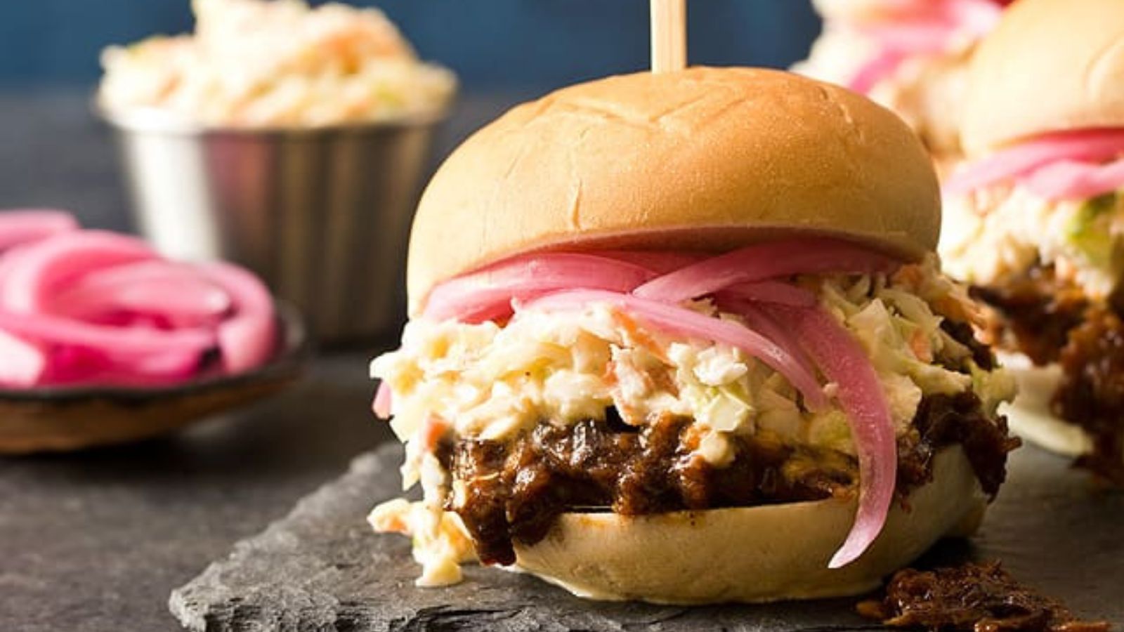 Small But Mighty: 21 Slider Recipes That Pack a Punch Slow Cooker Shredded Beef Sliders by Chocolate Moosey