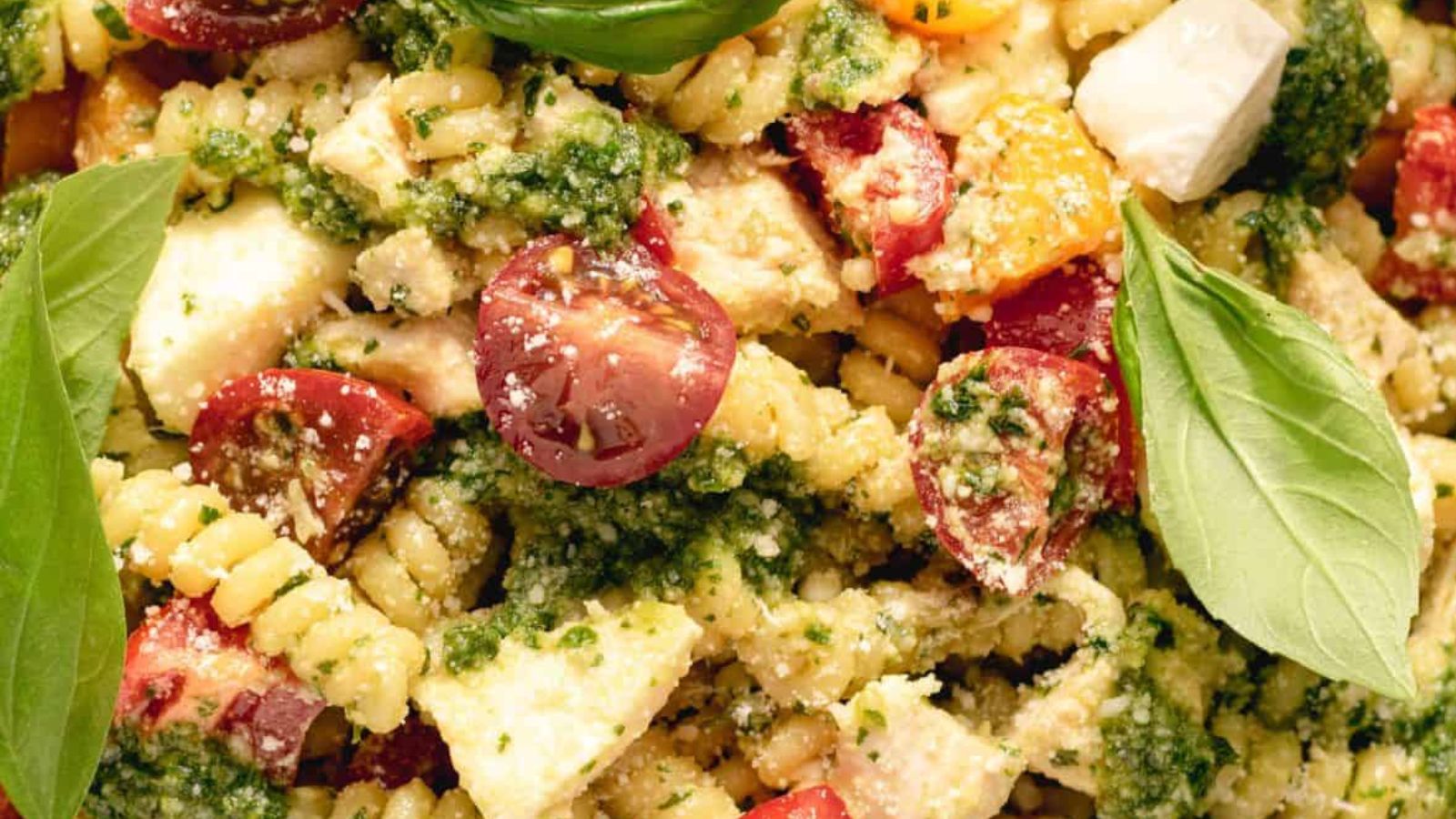 Host the Ultimate Fourth of July Cookout with These 28 Last Minute BBQ Recipes Summer Pesto Chicken Pasta Salad by Hey Snickerdoodle