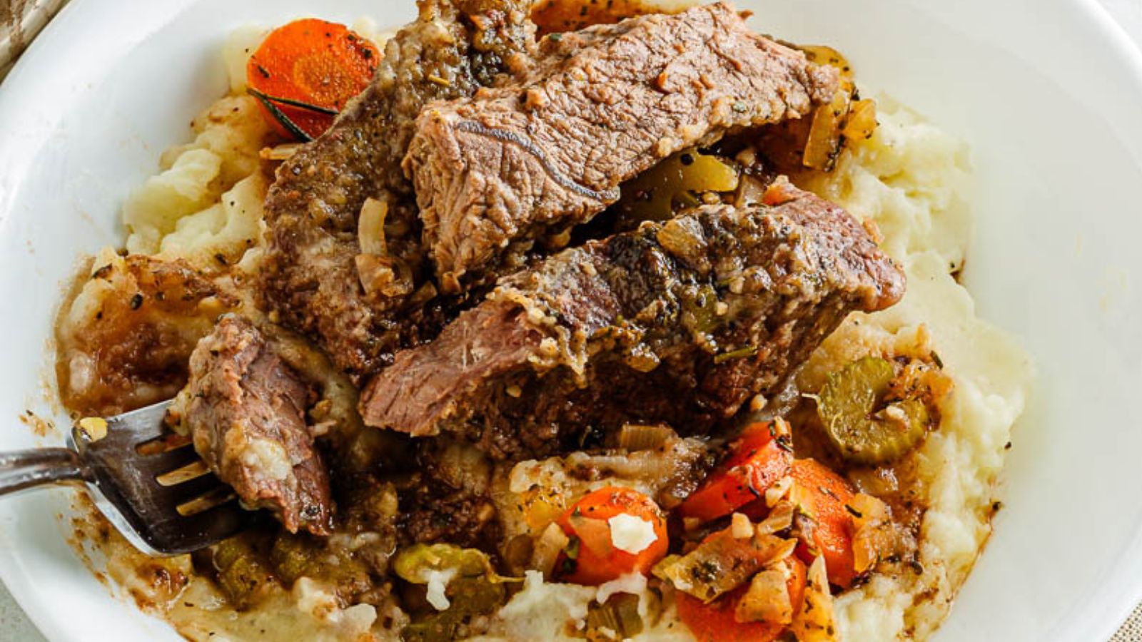 21 Italian Dishes That’ll Make You Swipe Right on Your Plate Ultimate Italian Short Ribs (Braised Beef Ribs) by Delectable Food Life