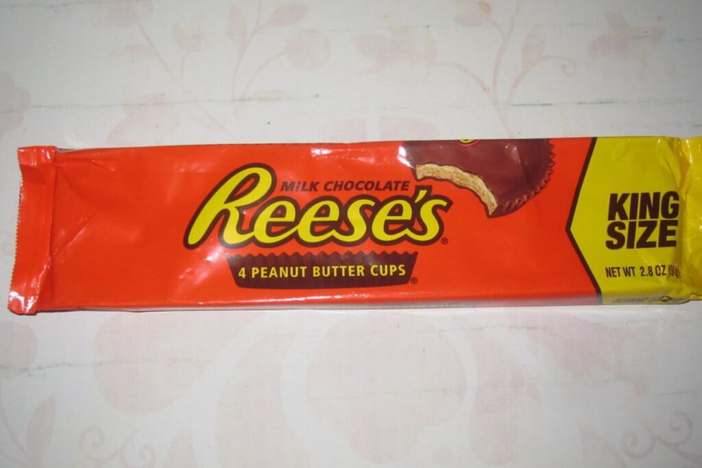 An unopened pack of Reese's Peanut Butter Cups.