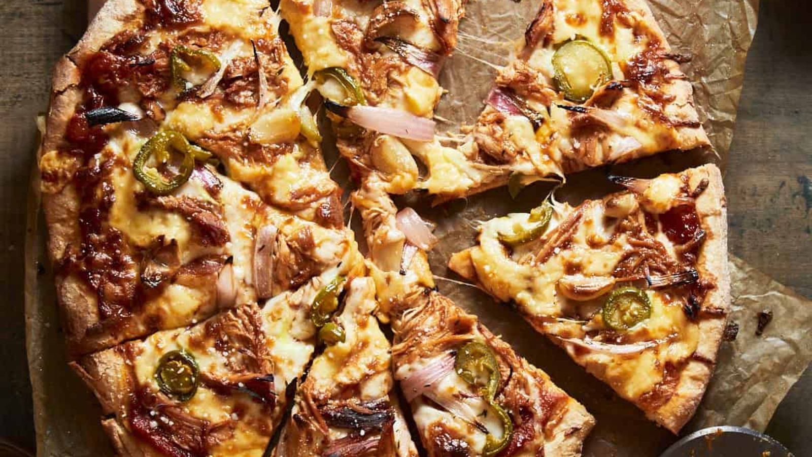 21 Tasty Recipes For Your Leftover Rotisserie Chicken BBQ Chicken Pizza with Smoked Gouda by The Virtual Caterer