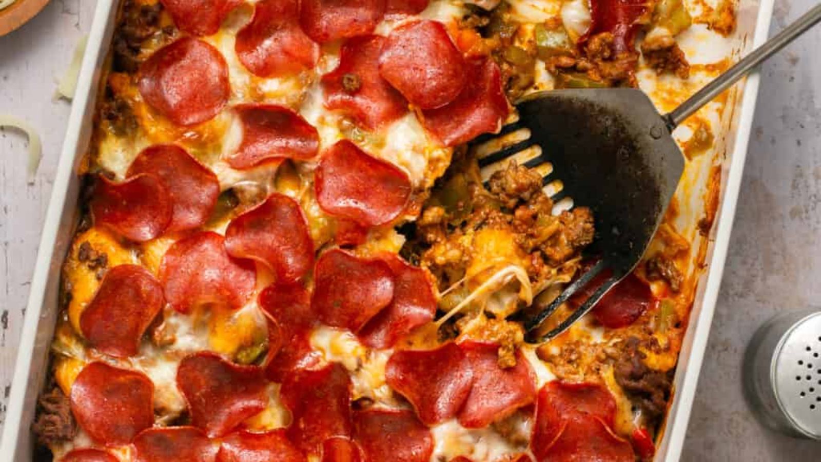 "Where Has This Been All My Life?" 14 Bubble Up Recipes Bubble Up Pizza Casserole with Biscuits by Lauren Fit Foodie