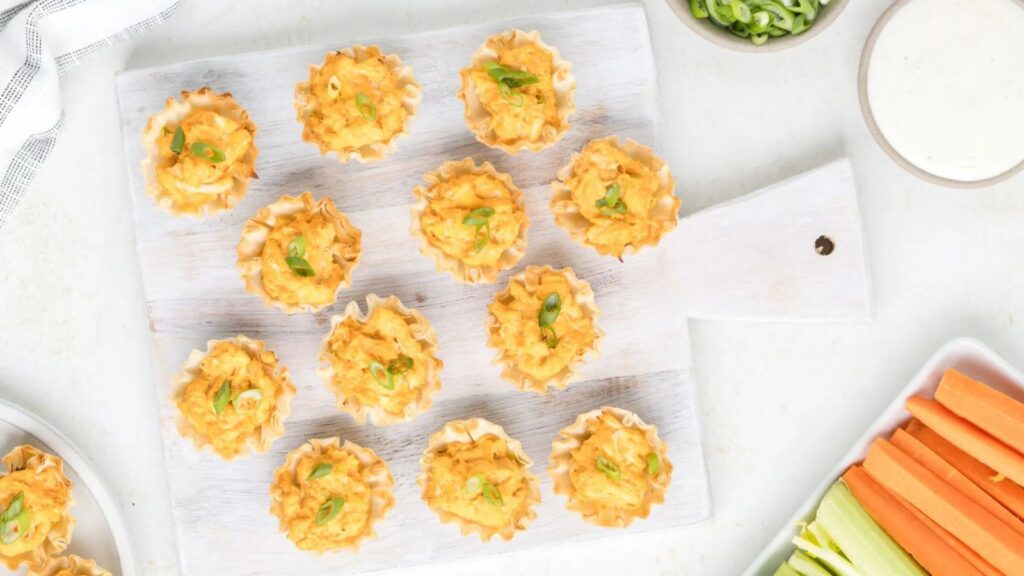 21 Tasty Recipes For Your Leftover Rotisserie Chicken Buffalo Chicken Phyllo Cups by Semi Homemade Kitchen