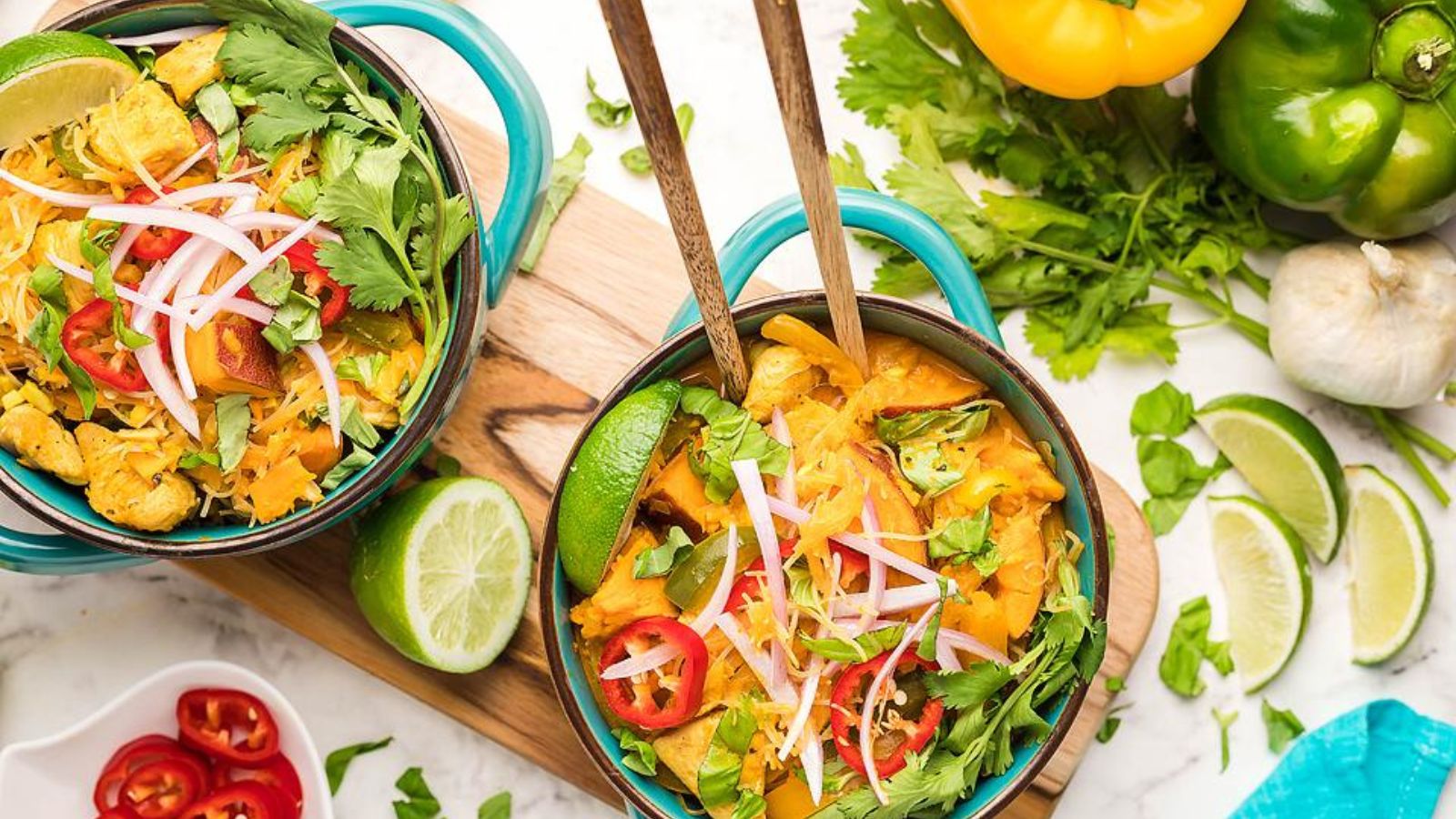 Get Your Spice On: 20 Delicious Curry Recipes Flavourful Red Curry Thai Coconut Chicken Soup with Sweet Potatoes and Peppers by Xoxo Bella