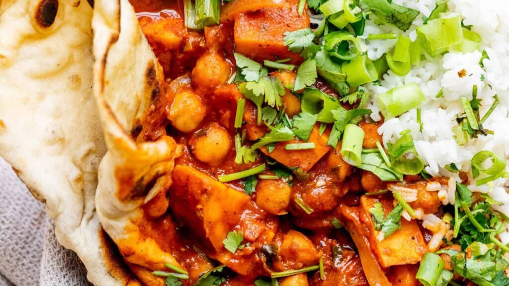 Get Your Spice On: 20 Delicious Curry Recipes Sweet Potato Curry with Chickpeas by Britney Breaks Bread