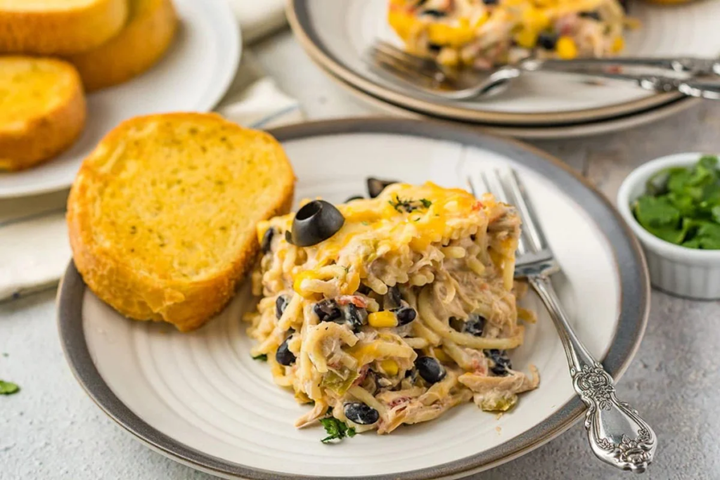 21 Tasty Recipes For Your Leftover Rotisserie Chicken Fiesta Chicken Pasta Casserole Bake by Xoxo Bella