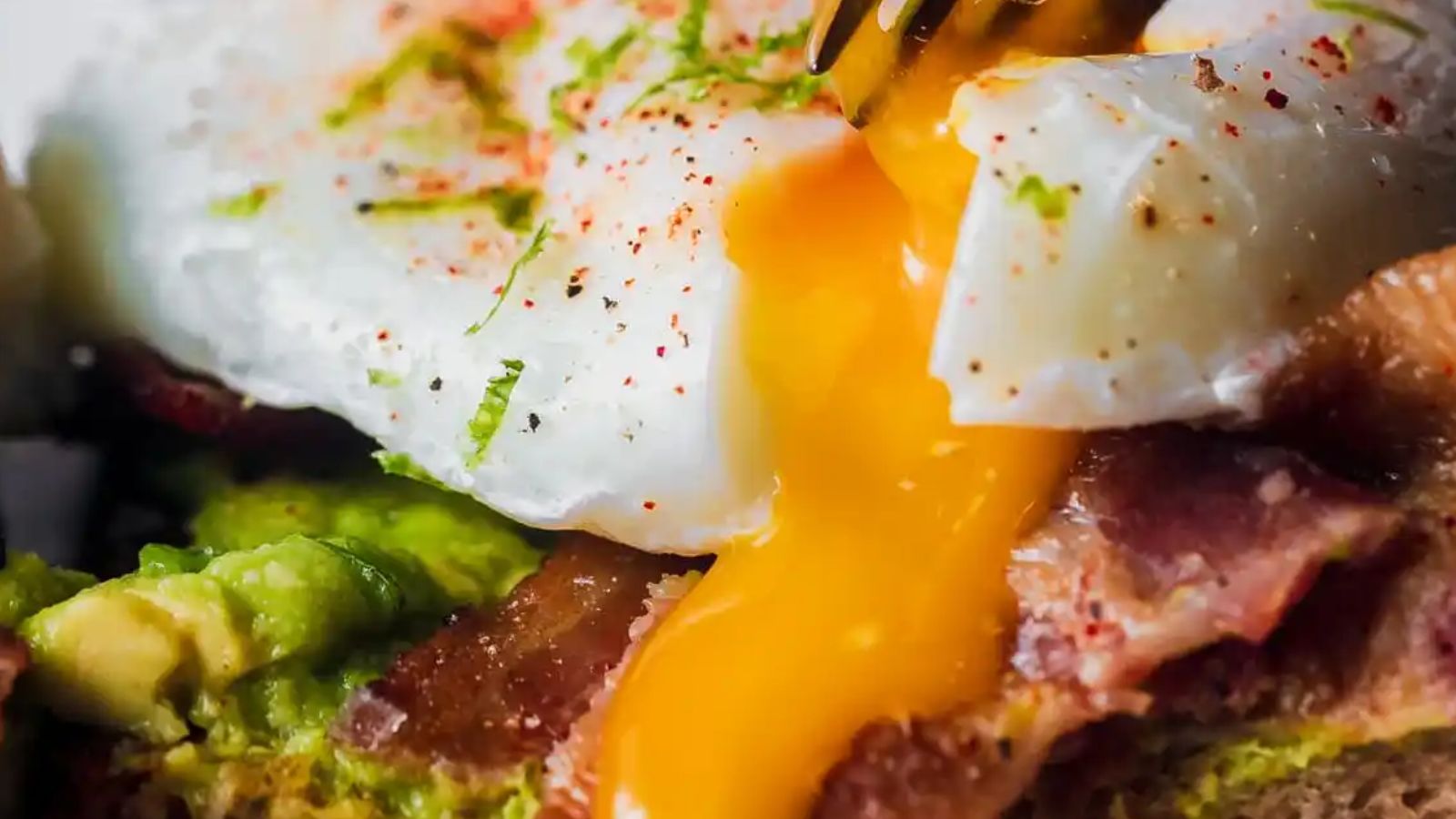 22 Recipes That'll Make You Obsessed with Avocado Avocado Toast with Bacon and Poached Eggs by Sweet Tea and Thyme