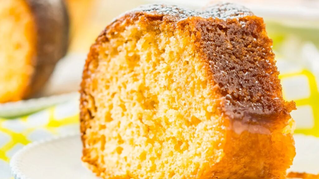 22 Caribbean Dishes That'll Knock Your Flip Flops Off Coconut Rum Cake by Sugar and Soul