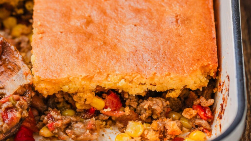Saddle Up for Flavor: 21 Cowboy Recipes That’ll Have You Hollerin’ For More Cowboy Cornbread Casserole by The Cookin' Chicks