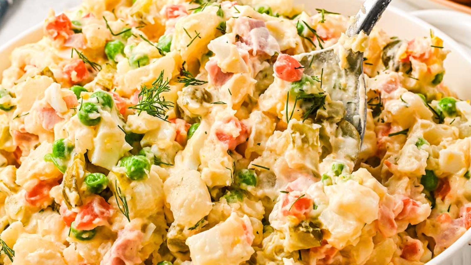 20 Labor Day Eats So Delicious, You’ll Forget the Summer's Almost Over Ham Potato Salad by Homemade Hooplah