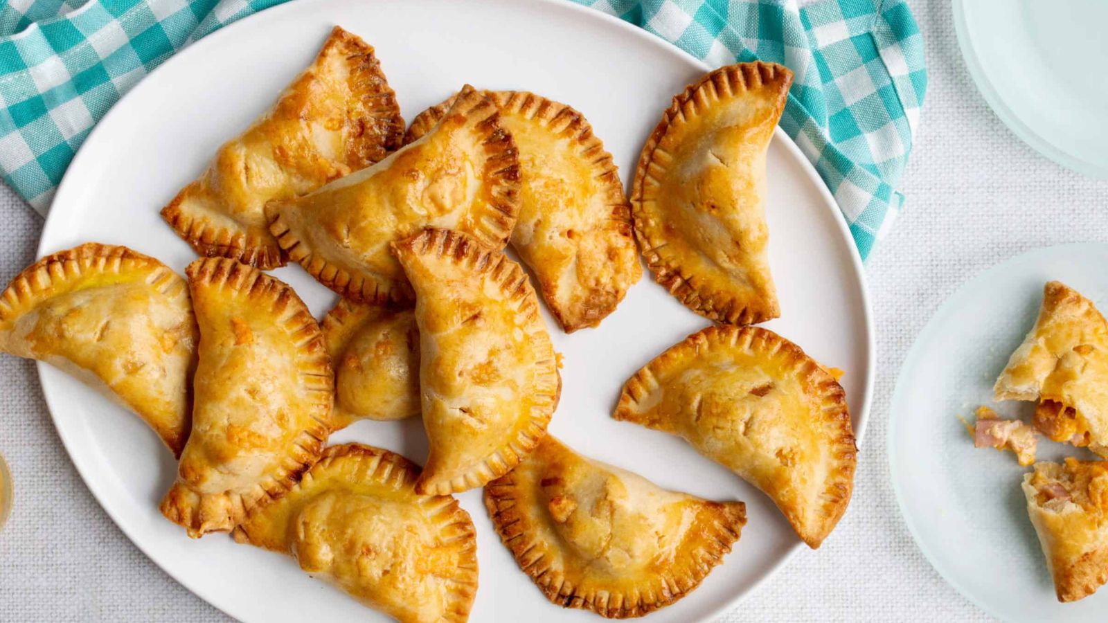 22 Caribbean Dishes That'll Knock Your Flip Flops Off Short-Cut Sautéed Onion, Ham, and Cheese Empanadas by Little Black Skillet