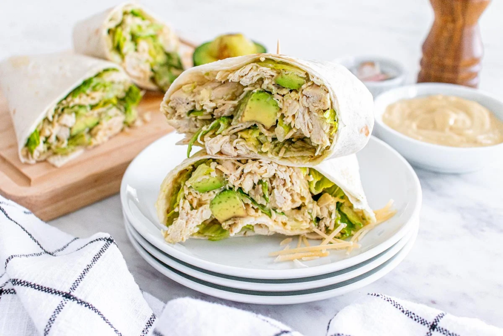 22 Recipes That'll Make You Obsessed with Avocado Chicken Caesar Avocado Wrap by Xoxo Bella