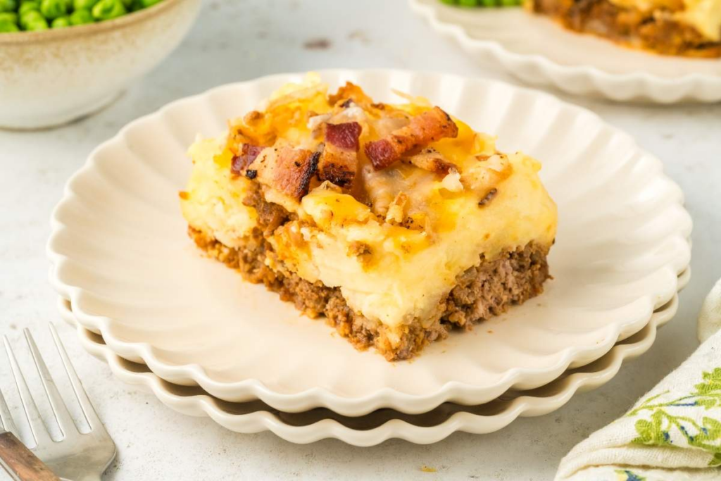 Saddle Up for Flavor: 21 Cowboy Recipes That’ll Have You Hollerin’ For More Cowboy Meatloaf and Potato Casserole by Xoxo Bella